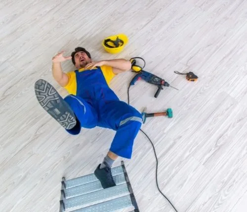 Man falling off a ladder